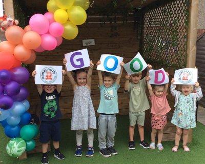 children-celebrating-ofsted-good