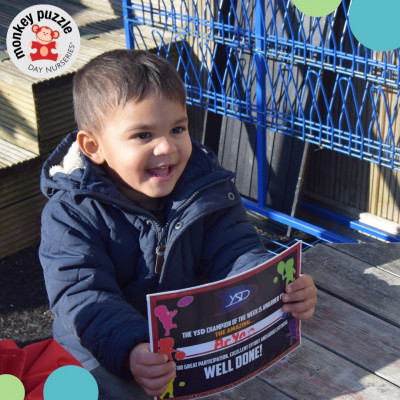 nursery-child-with-sports-certificates