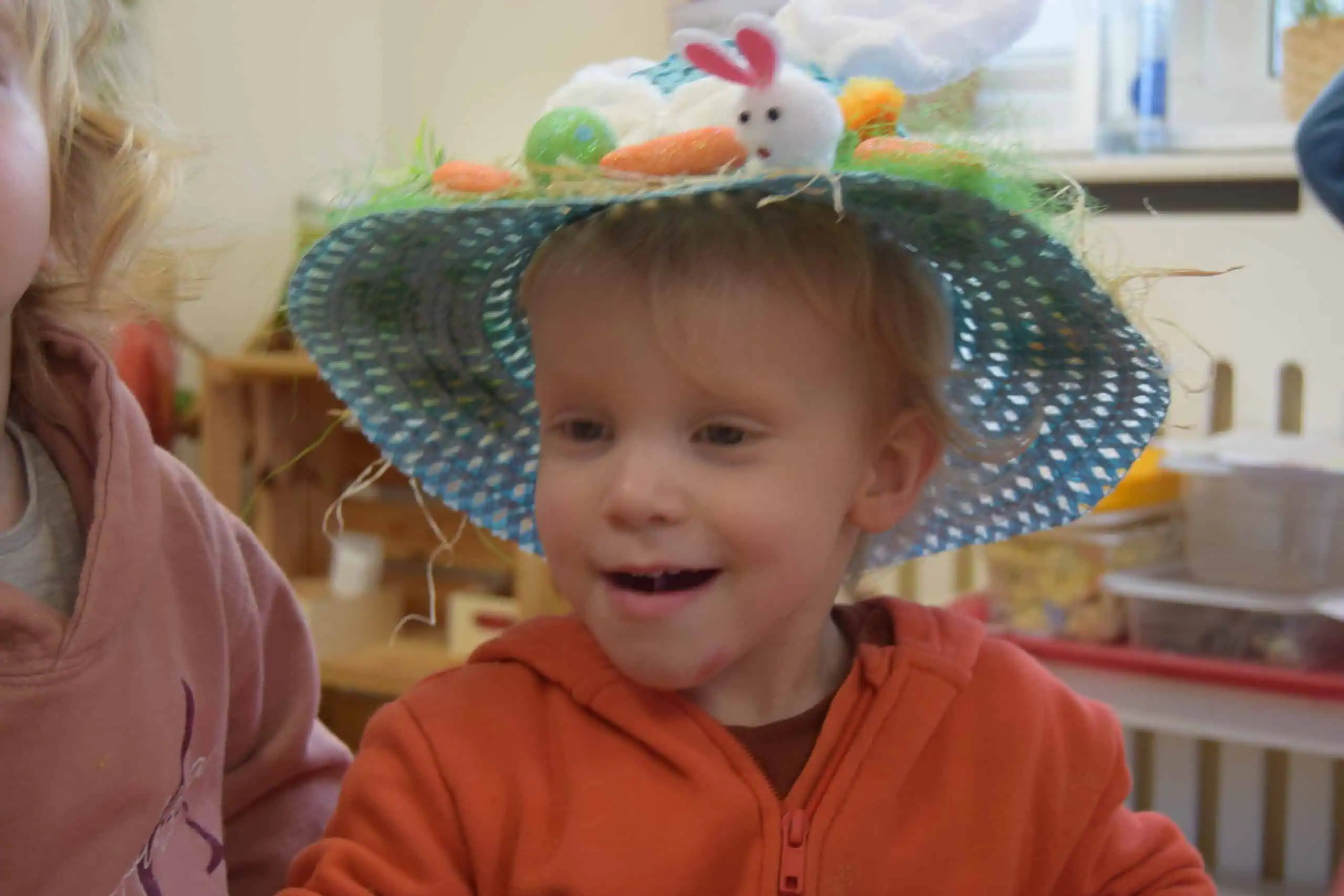 nursery child in easter hat nursery child in easter hat
